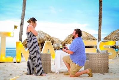 couple proposing on beach punta cana