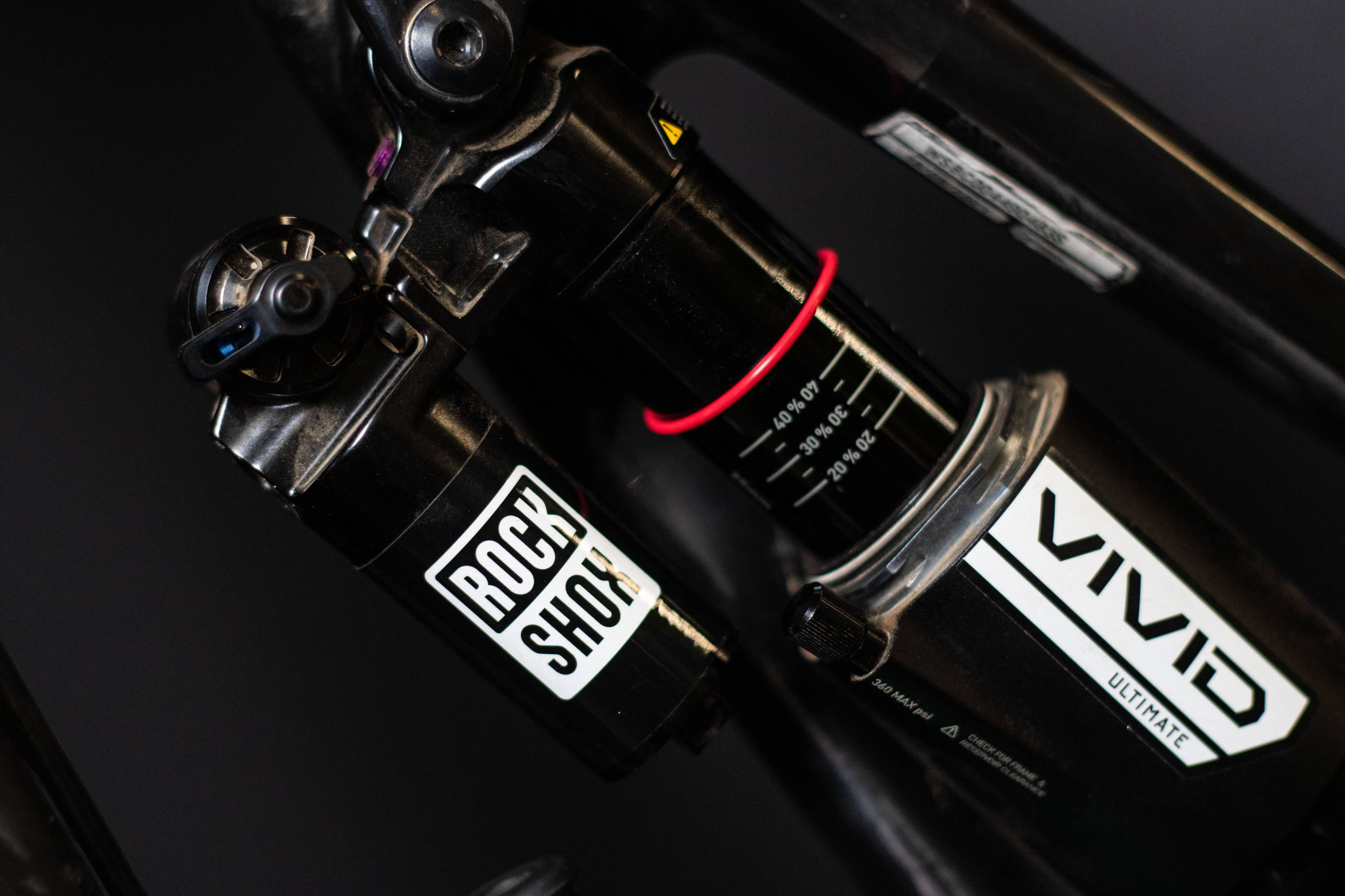 detail of the rc2t damper and touchdown damper on a rockshox vivid ultimate rear shock on a specialized stumpjumper mountain bike for the vivid overview and first looks