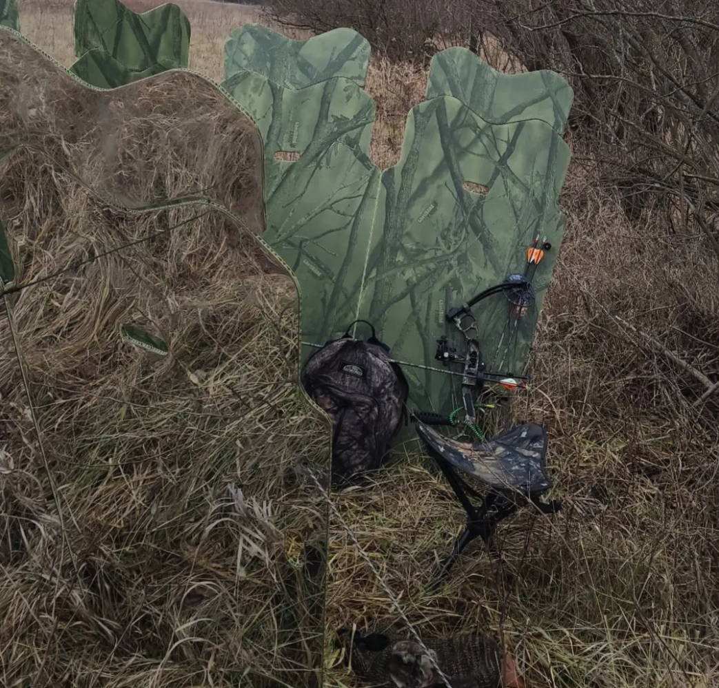 backside view of a bow hunter's ghostblind setup