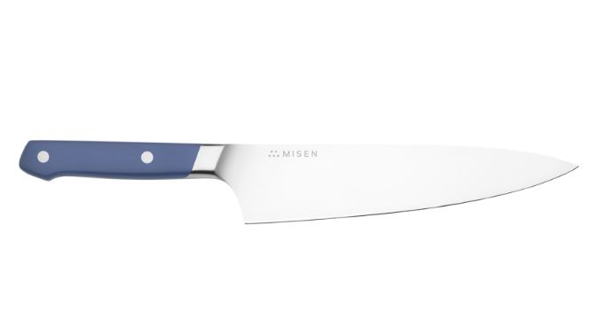 The Misen Chef's Knife features a thick spine and a hybrid German/Japanese belly.