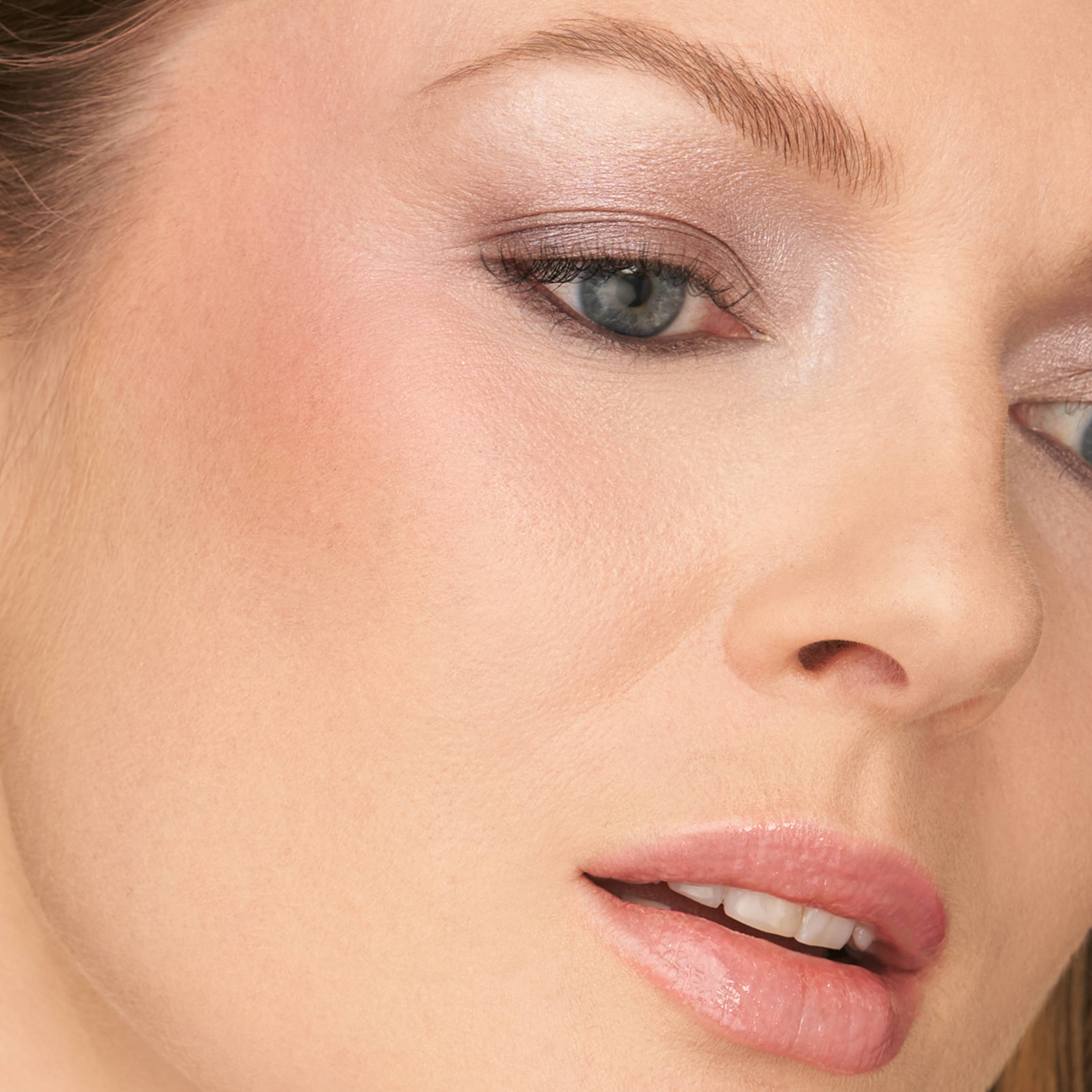 image of a model wearing eye shadow and lip color