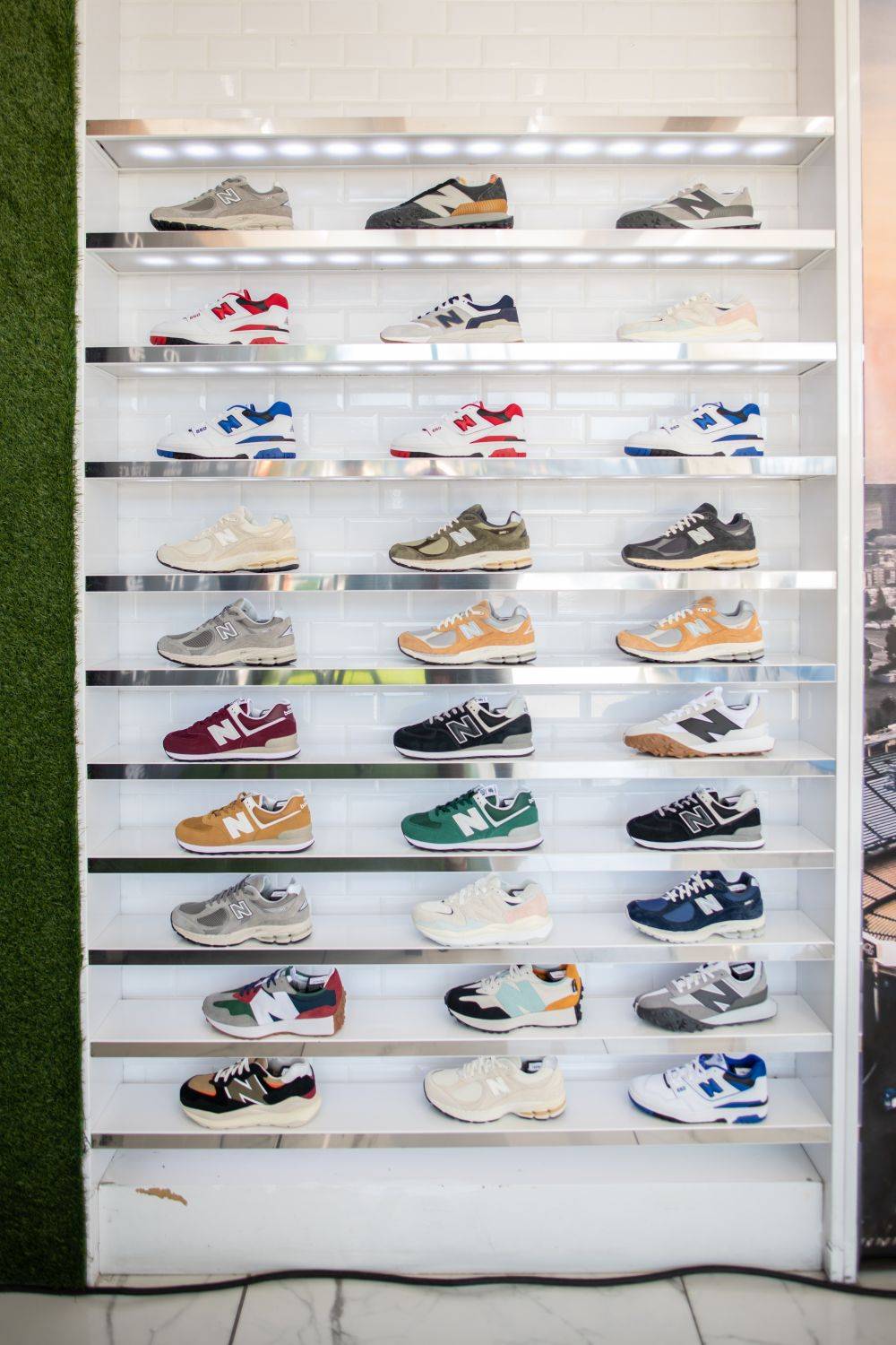 sp x new balance shoe wall