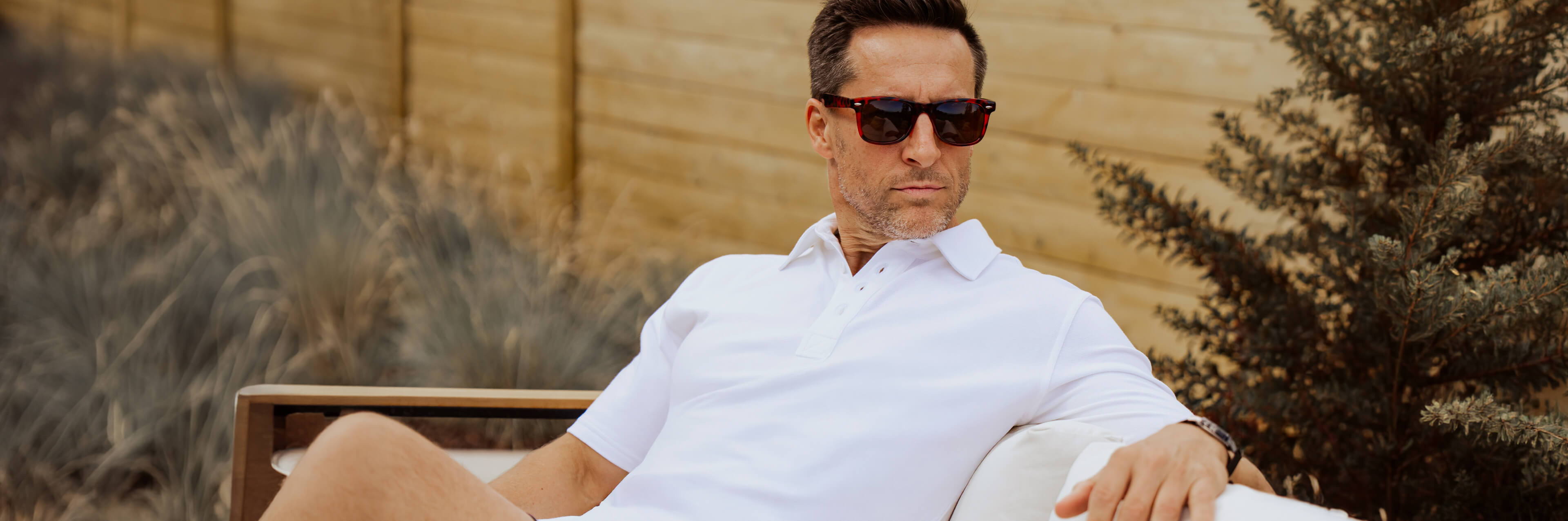 a man wearing a cariloha polo