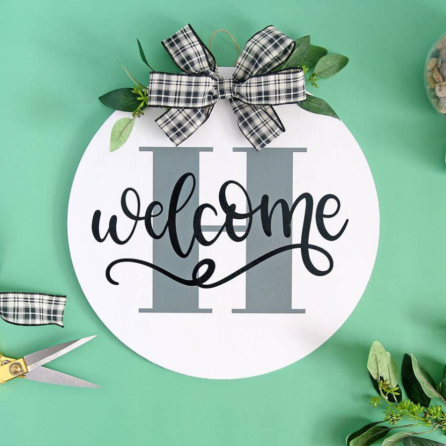 monogrammed welcome sign using craftables adhesive vinyl 