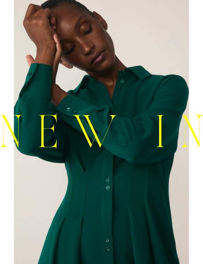 Shop New In - Model wearing green Amara dress
