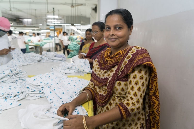 Worker in a fair trade certified factory in India.