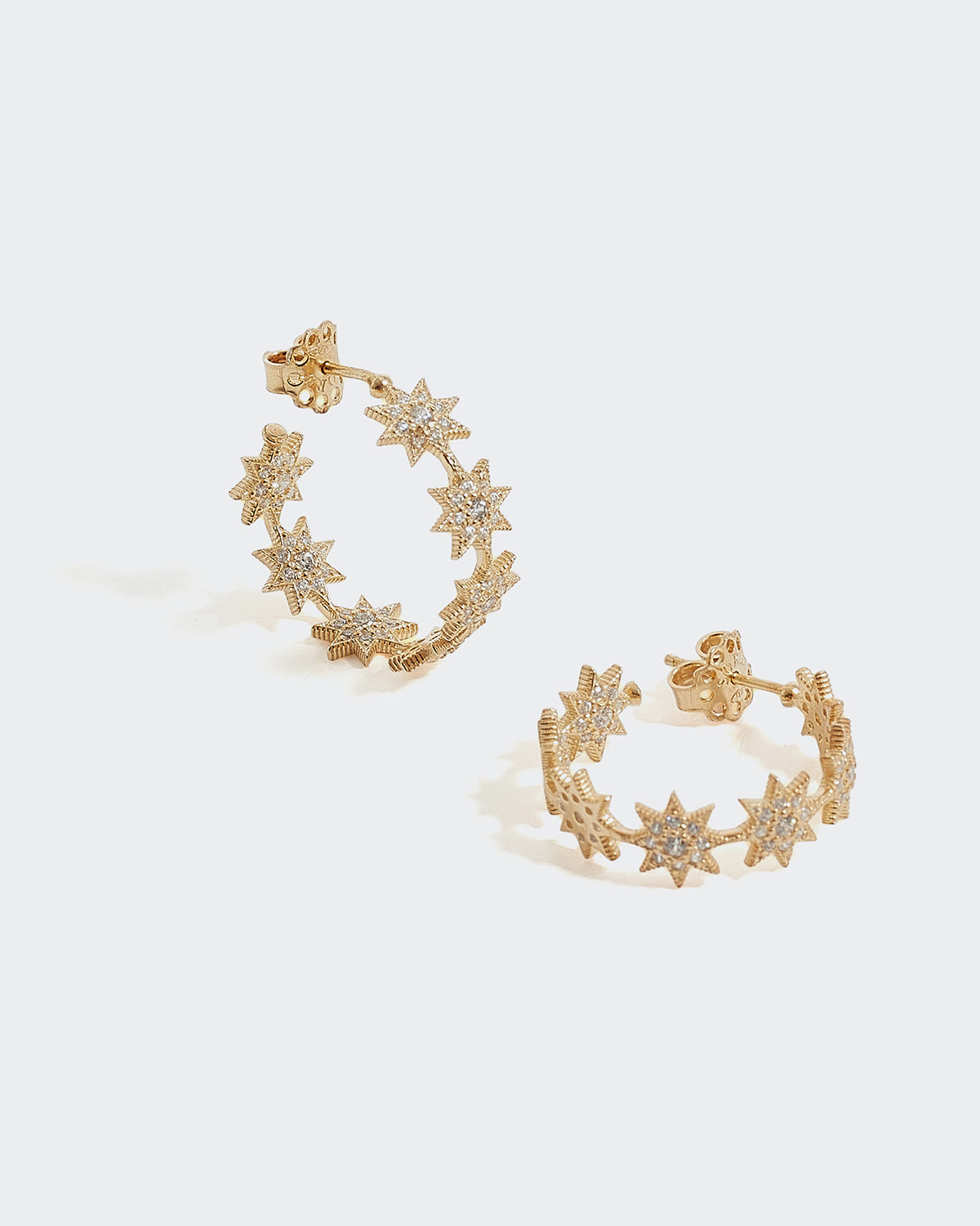 Soru Jewellery Intricate Cosmic Hoop Earrings with delicate interlocking stars embellished with clear Swarovski crystals24ct gold plated solid silver and crystals