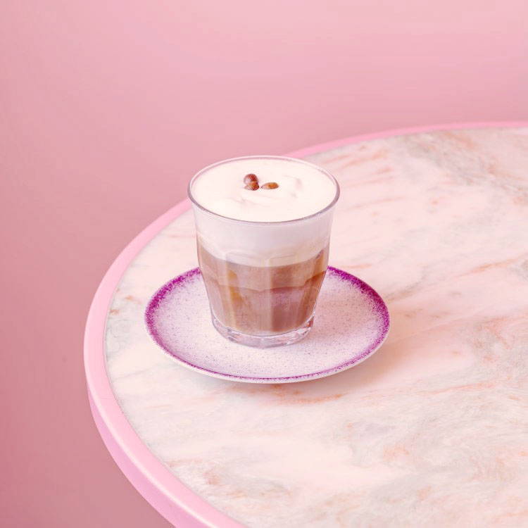 Freddo Cappuccino in front of pink background