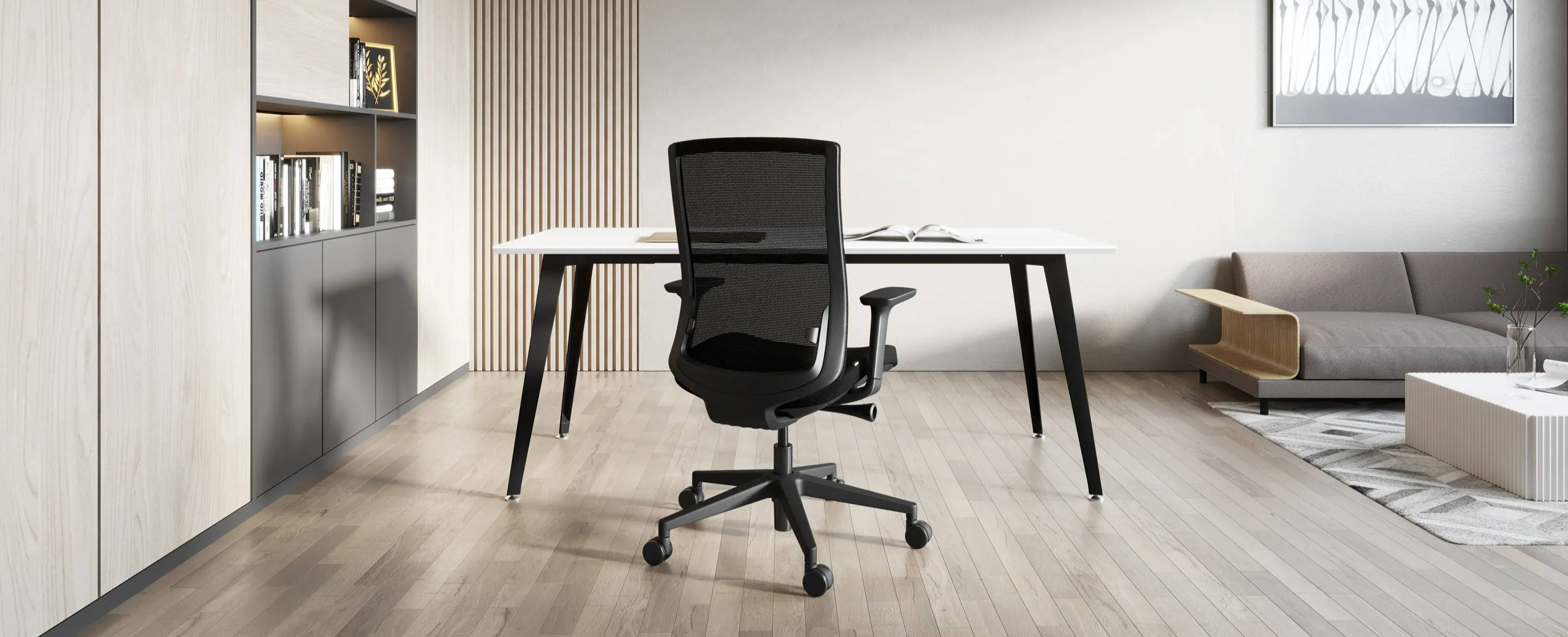 La chaise de bureau ergonomique Ergo en noir dans le bureau à domicile