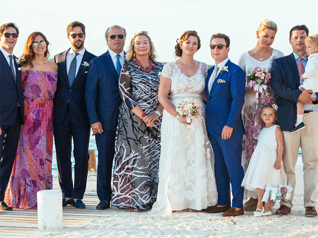 Ala Isham and her family at a destination wedding in Antigua in the Carribbean wesring custom garments by Ala von Auersperg