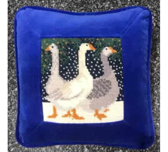 Finished Snow Geese needlepoint pillow