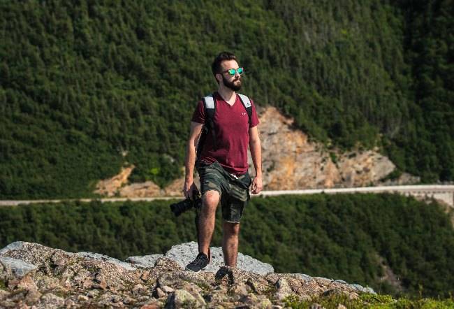 Man wearing hiking sunglasses