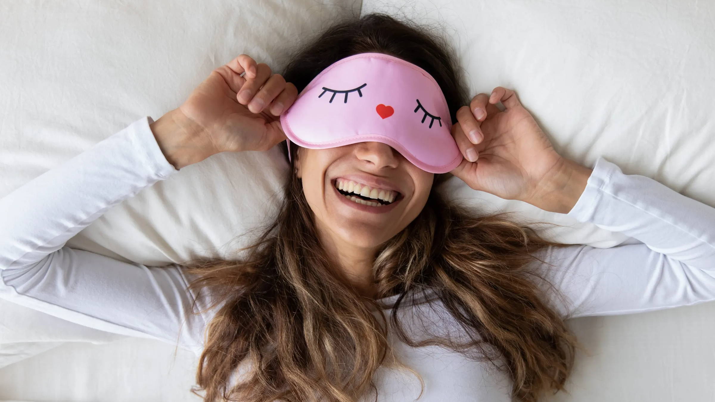 Woman using sleeping mask.