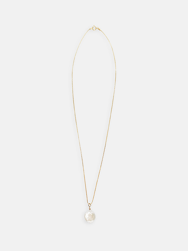 A product image of the Margaux Studios pearl drop necklace on a gold chain.