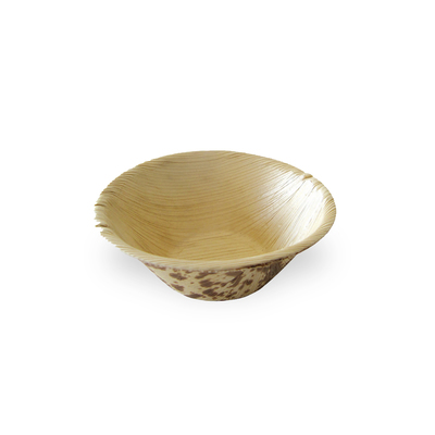 A round palm leaf mini bowl