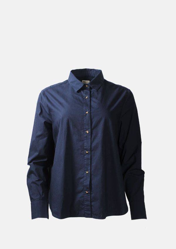 Product image of Dark Navy Juliette Shirt Bleu bu Sacrecoeur with long sleeves and tortoiseshell buttons.
