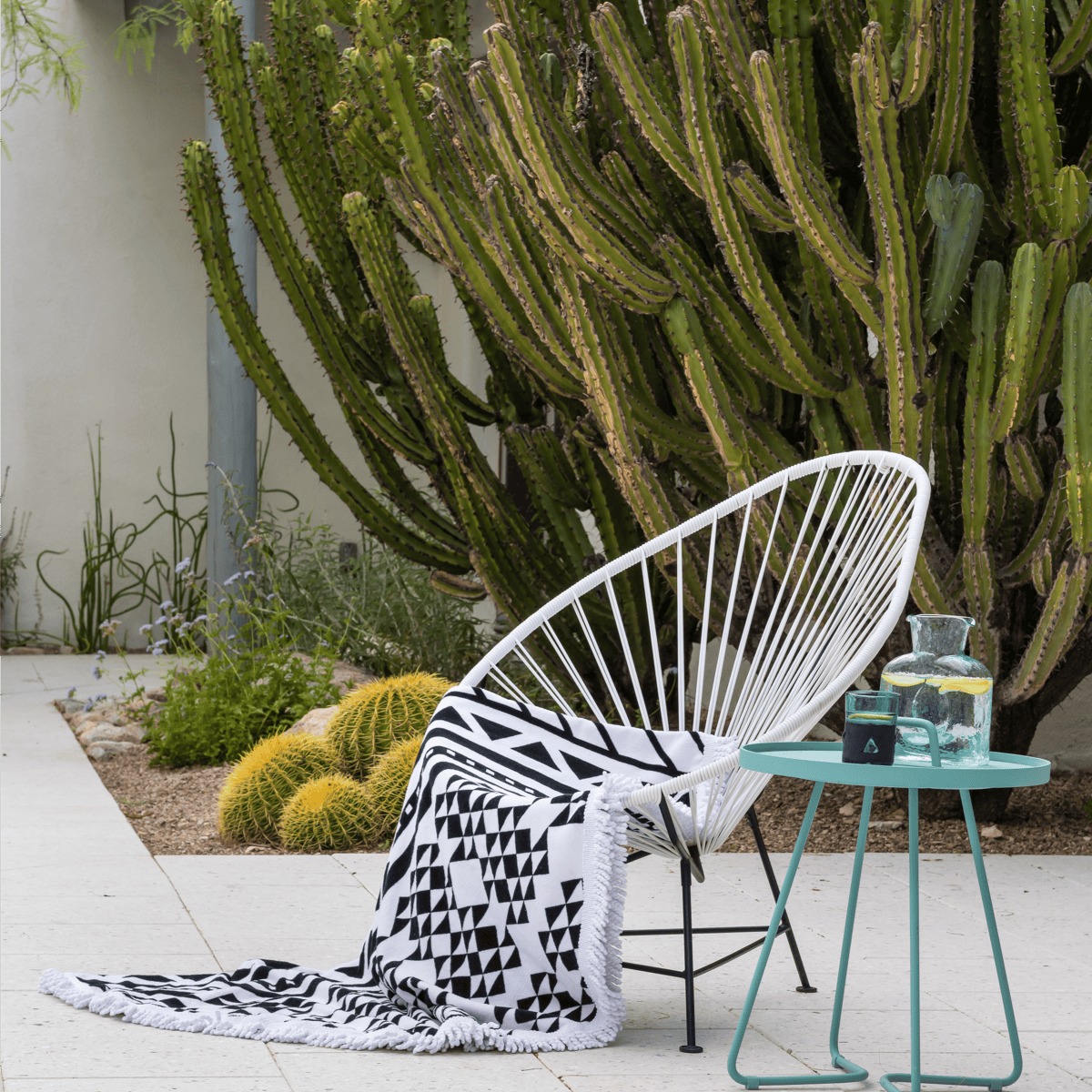 Boxhill's pastel acapulco lounge chair and on-the-move side table