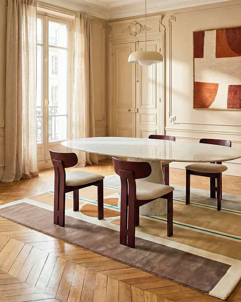 Abstract Toulemonde Bochart geometric design with circles and rectangles in earthy colors.