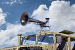 Roof-mounted black HornBlasters air horn sky clouds olive Humvee windshield Prodigy TV Warship KM-110 air horn gallery photo 3