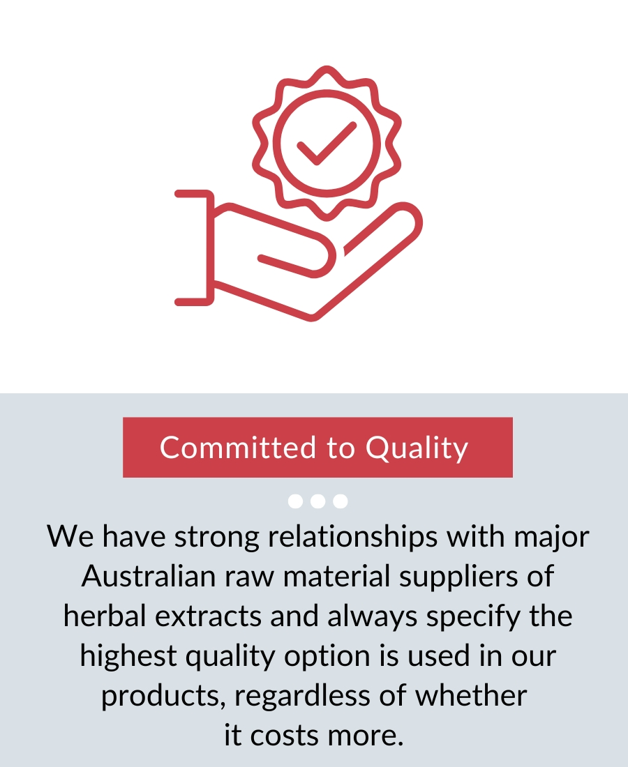 Hand holding a badge symbolizing quality commitment.