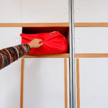 A quilt storage bag stored in a closet