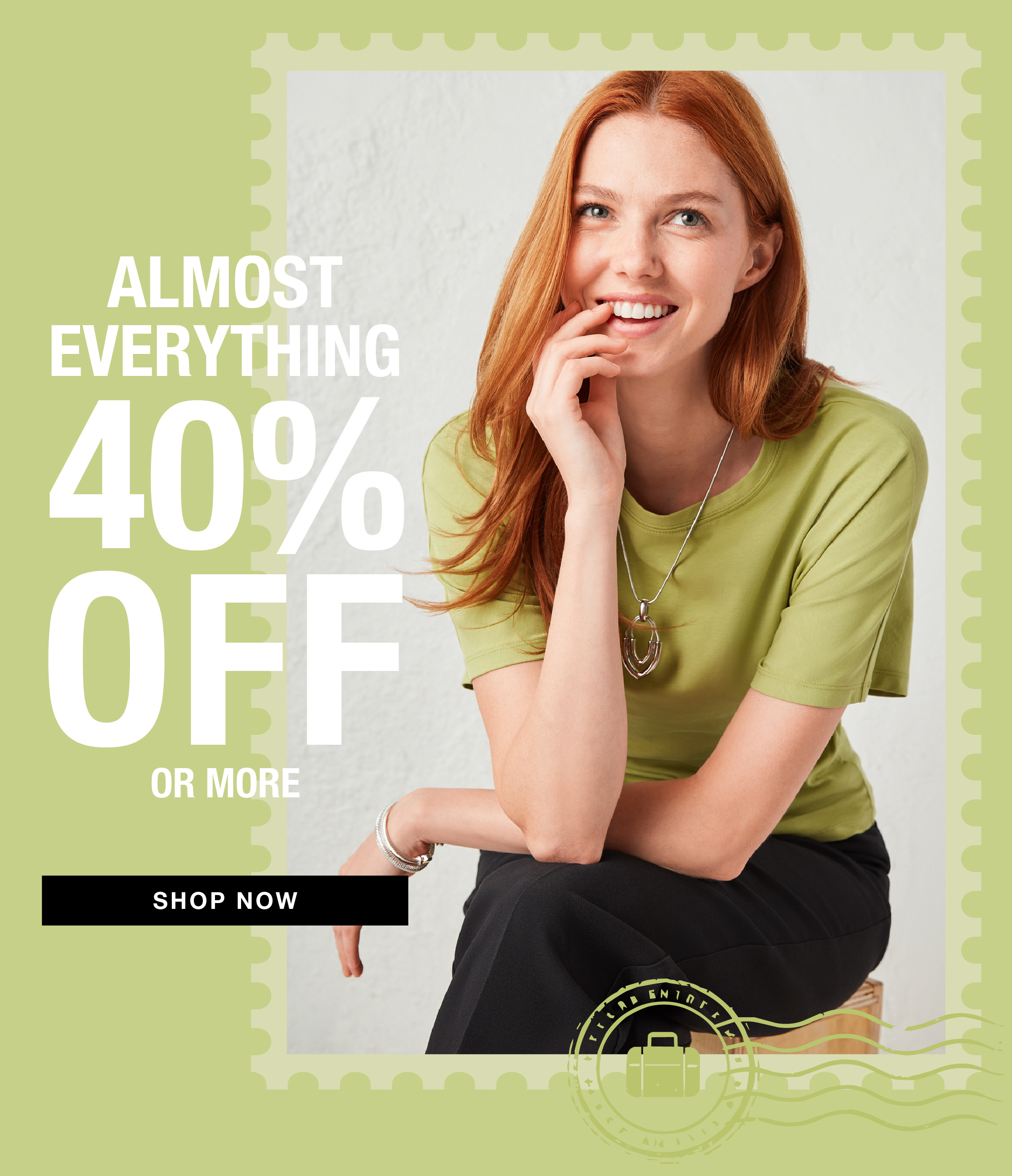 Woman smiling in a green shirt. Almost everything 40% off or more.