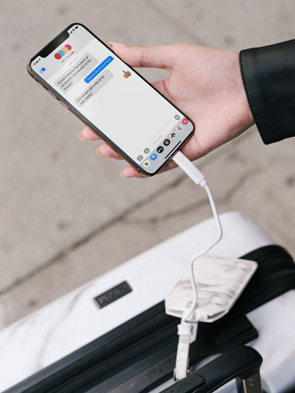 CALPAK luggage tag with portable charger