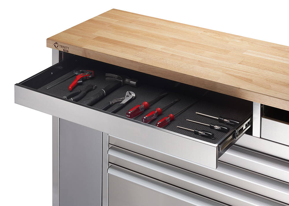 open drawer filled with tools with slider visible 