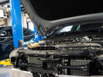 Engine bay two black train horns radiator bumper off Nicollette's 2022 Kia K5 Conductor's Special 232 HornBlasters customer install gallery photo 7