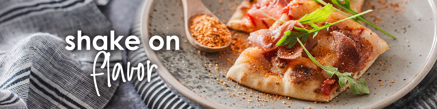 shake on flavor. hot honey seasoning on flatbread.