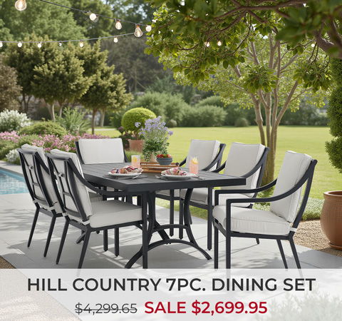 Hill Country 7-piece dining set with sale price displayed outdoors.