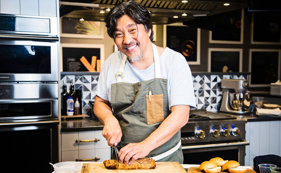 Chef Edward cutting food