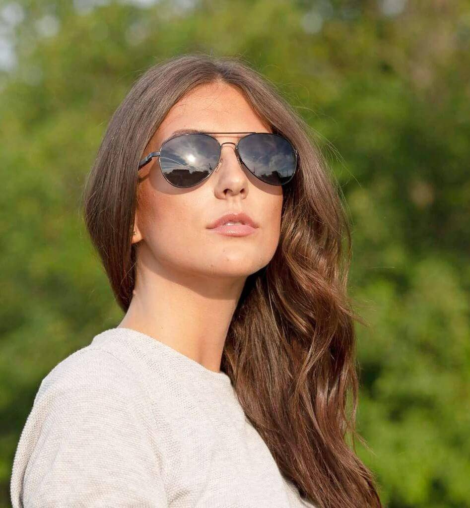 Woman wearing Leo, Black Aviator Trendy Sunglasses