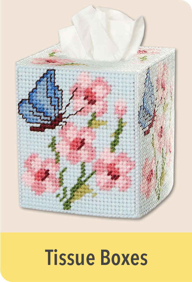Decorative tissue box with blue butterfly and pink flowers design.