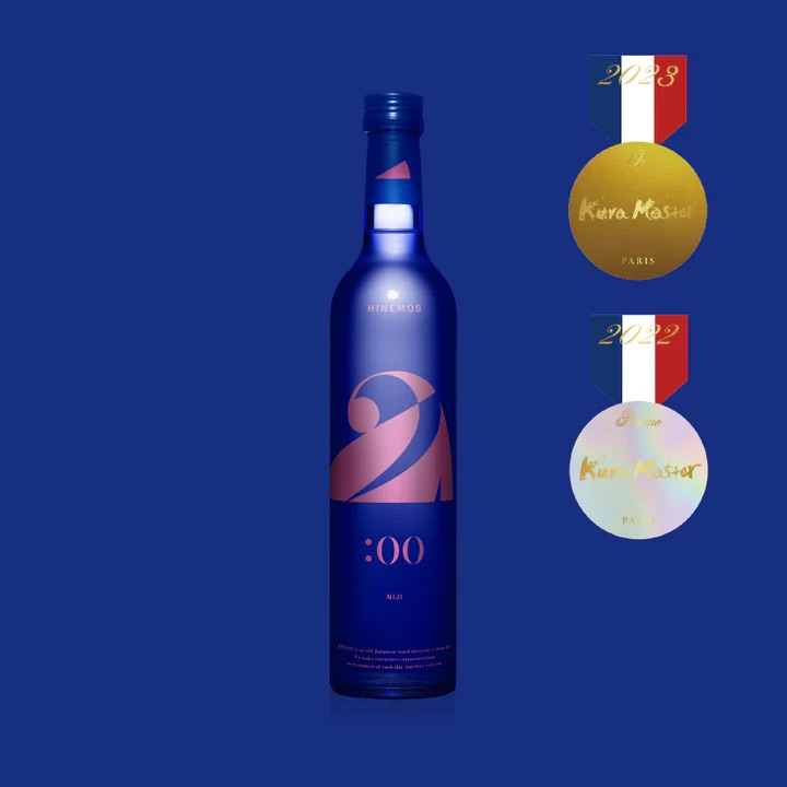 Bottle of wine with gold and silver medals on a blue background.