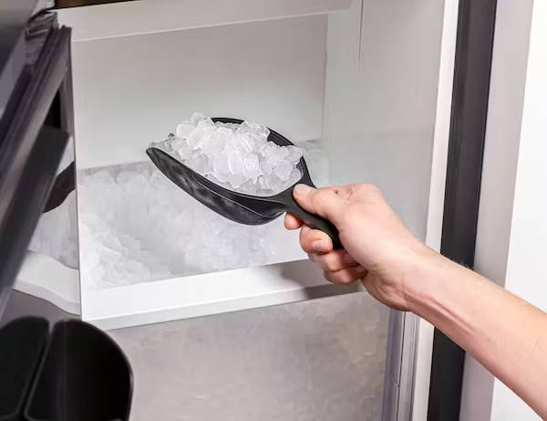 Person scooping nugget ice