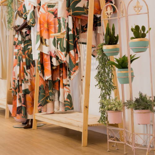artificial hanging plants and mixed foliaged decorated in bathroom