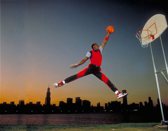 male model dunking a basketball