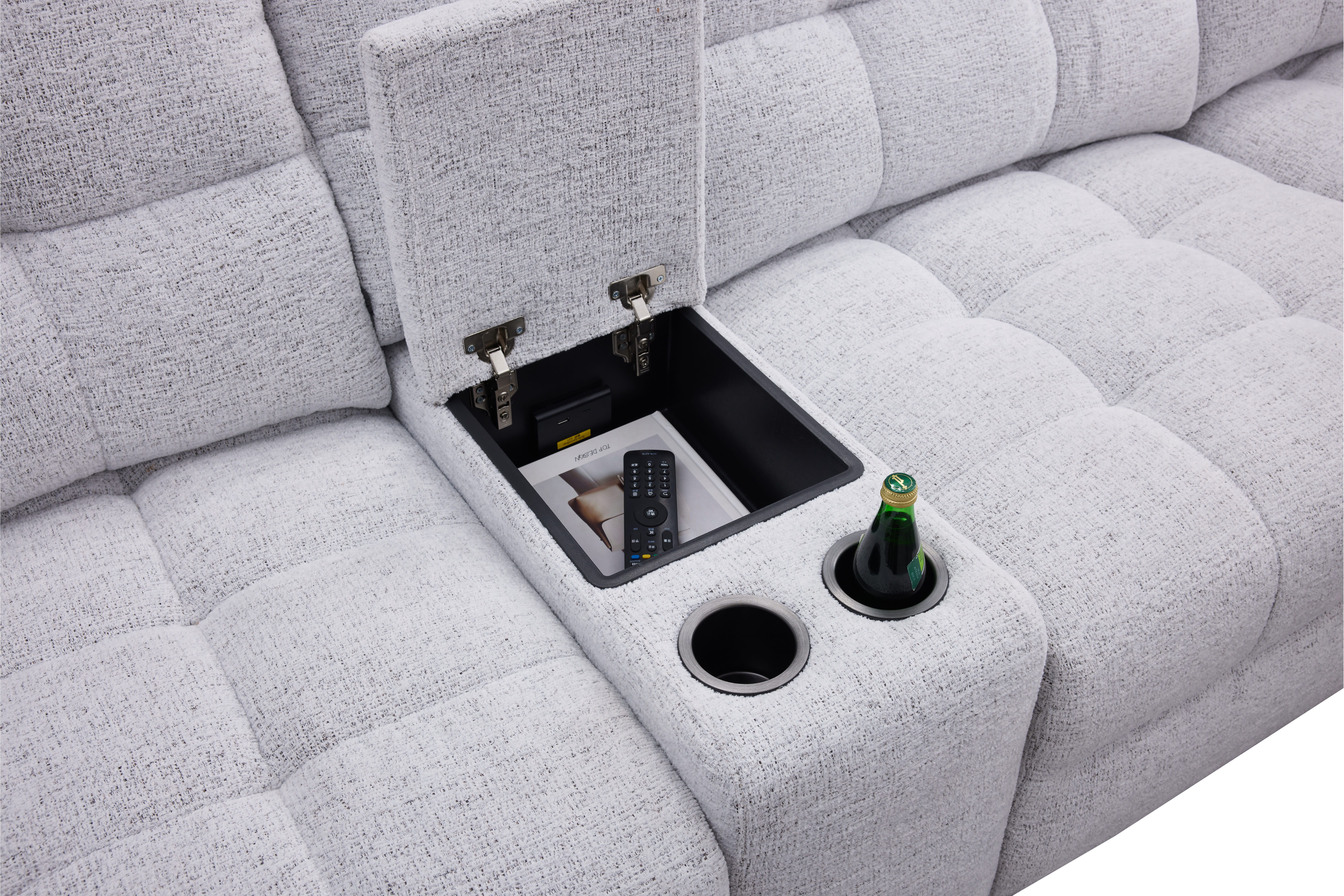 Gray sofa armrest with cup holder and storage compartment.