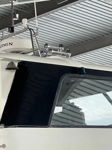 Chrome Strombos Nautilus triplex horns mounted on flybridge hardtop with Garmin radar photo 2