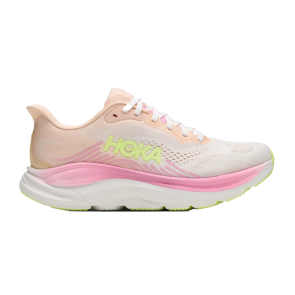 Light pink athletic shoe with white and green accents.