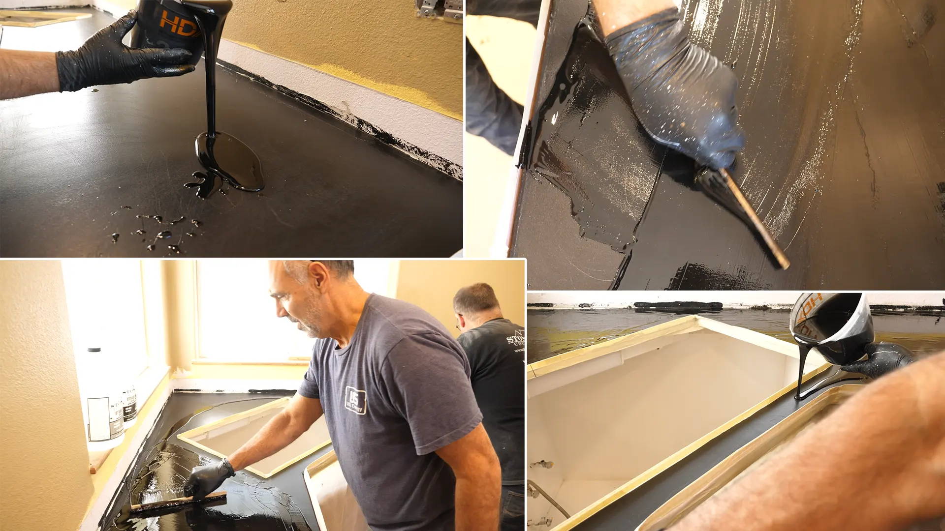 Applying black tinted epoxy on the countertops and spreading it with a mixing stick or gloved hand to cover the surface.