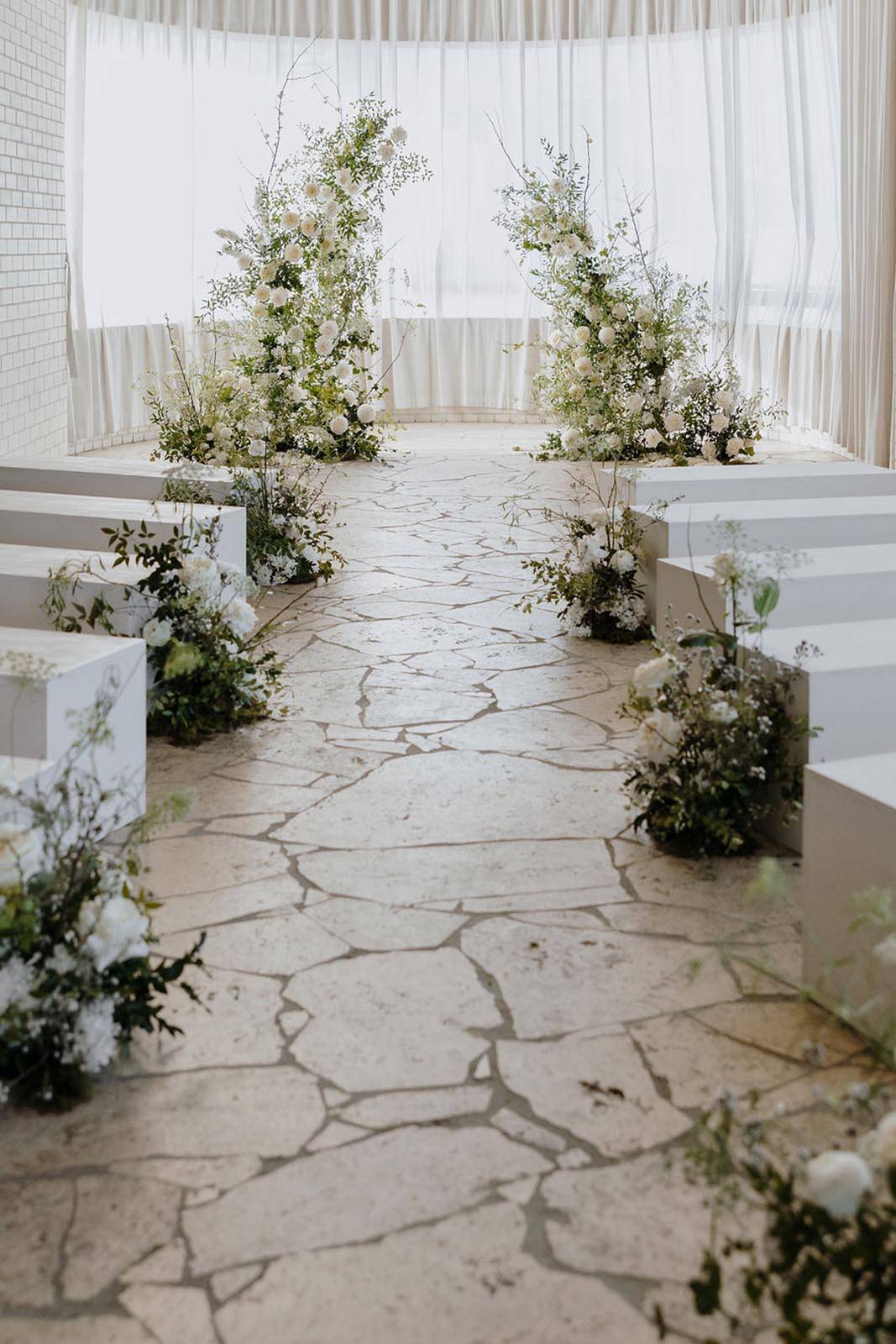 White colour palette wedding aisle