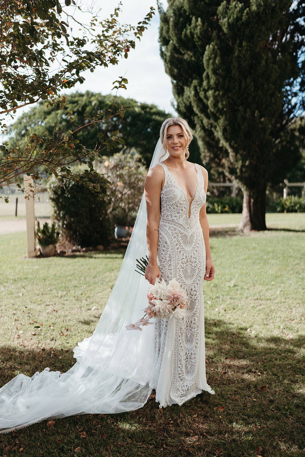 Bride in Grace Loves Lace Wedding Dress