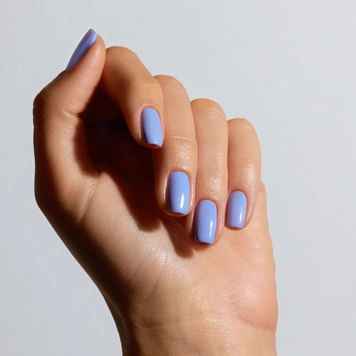 Shade Cruise from Glossify's Endless Summer collection on a light skin tone.