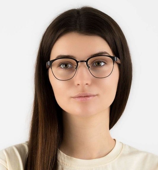 squared face women wearing Honest Black browline frame glasses on a white background
