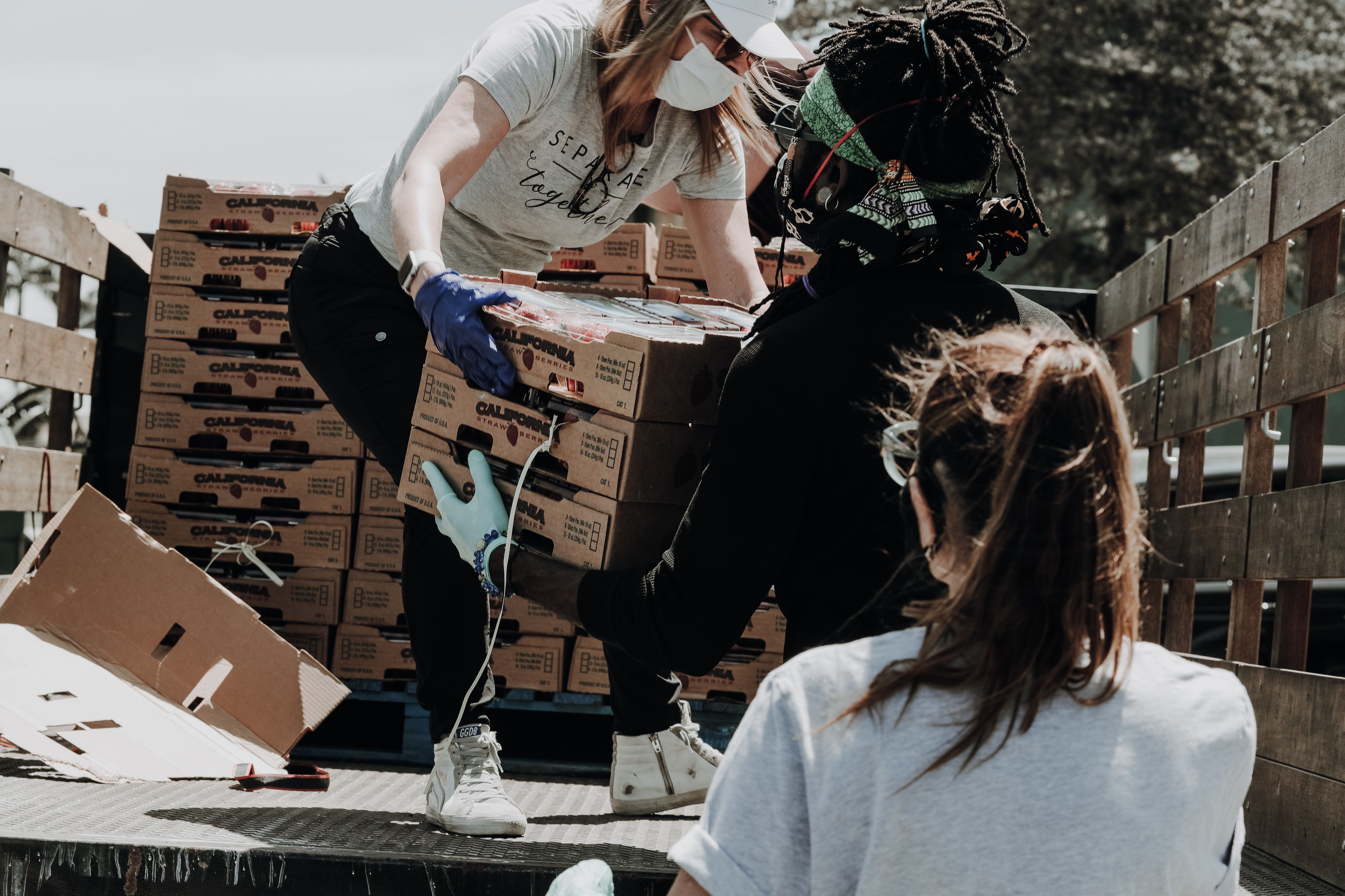 Image of people donating food to a charity