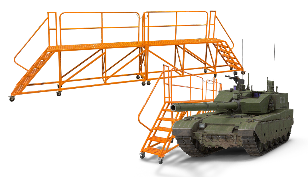Custom rolling defense vehicle production work platform engineered for welding access during assembly