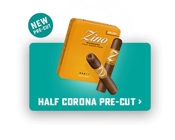Two pre-cut Zino Half Corona cigars in front of their yellow tin.