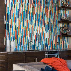 Accent wall using multi-colored thin strips of glass.